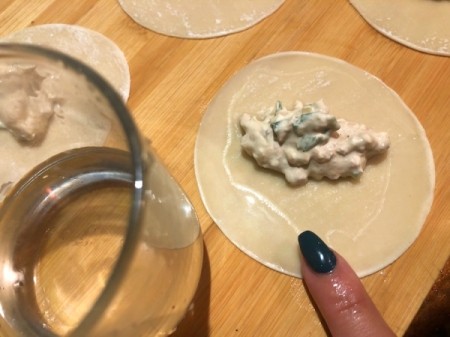 water on edge of gyoza wrappers