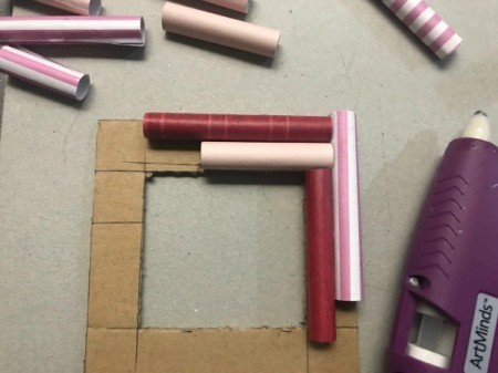 Picture Frame Magnet - use hot glue to attach rolls to frame