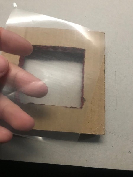 Picture Frame Magnet - cut piece of plastic bag