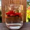 Strawberry scraps being used to make infused water.