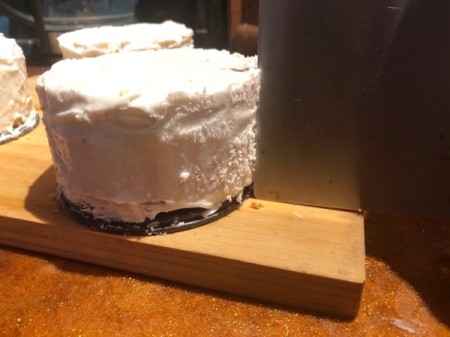 How to Make Sushi Cakes - remove from freezer and fill holes in frosting and use something to get a straight edge