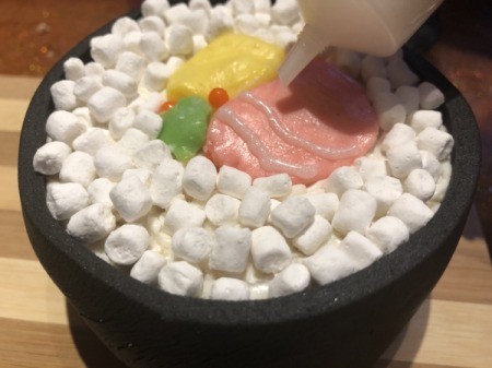 How to Make Sushi Cakes - use white icing pen to draw lines on the salmon for texture and drop orange balls around the avocado