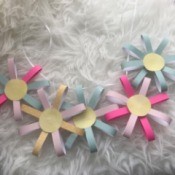 Paper Floral Garland - garland lying on a fluffy faux fur background
