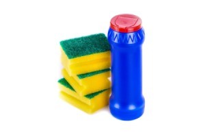 Powdered Cleanser bottle with a stack of sponges.