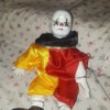 Identifying Porcelain Dolls - clown doll with yellow and red outfit