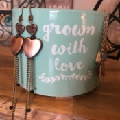 Handmade Jewelry Business Name Ideas - heart motif dangle earrings on cup