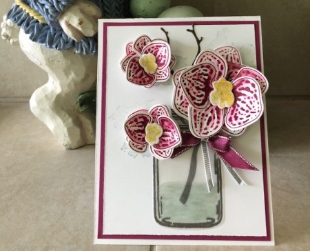 3D Orchid in a Jar Card - glue the pink card stock to the folded piece. Add a ribbon bow below the lip of the jar.