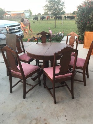Value of an Antique Round Table - table and chairs in driveway