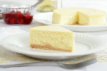 Slice of Cheesecake on a white dish