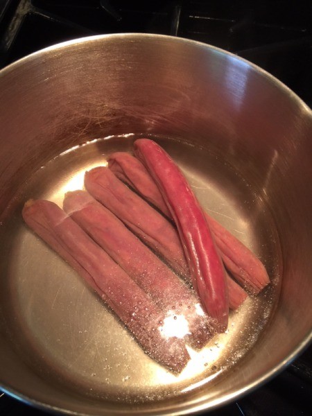 boiling sausages in pan