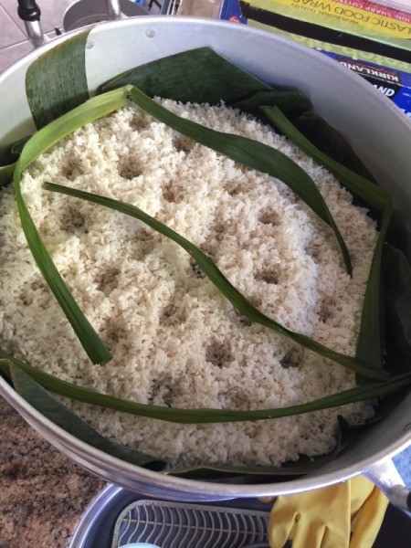 Sticky Rice in banana leaf lined steamer bowl