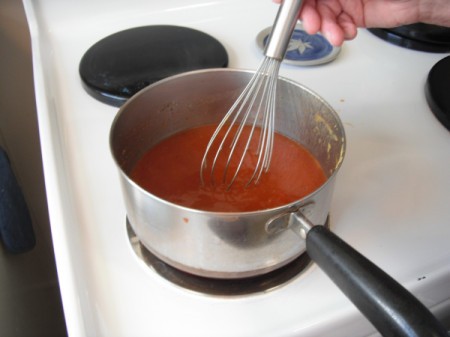 mixing BBQ sauce in pan