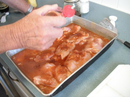 sprinkling chicken with paprika