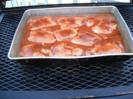 Barbecued Chicken in pan on grill