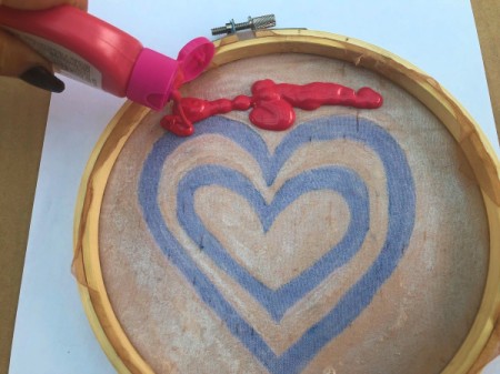 DIY Screen Printing - place hoop over when you will place the design and squirt on paint