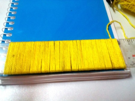 DIY Fur Covered Notebook - wrap the yard around the ruler