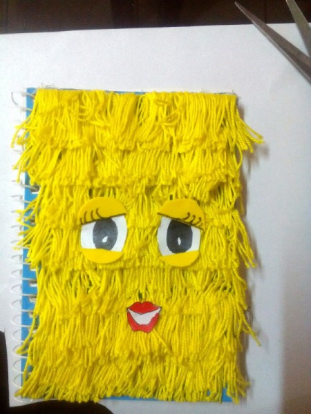 DIY Fur Covered Notebook - decorate by adding eyes and lips