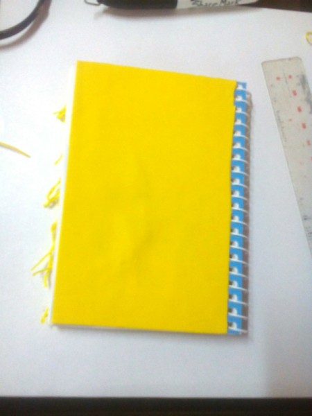 DIY Fur Covered Notebook - cover the back with foam board or more rows of yarn