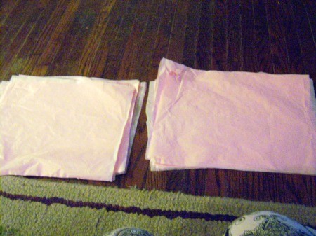 Make Big Showy Flowers from Plastic Tablecloths - keep cutting until you reach the size for your flower