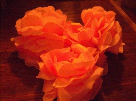 Make Big Showy Flowers from Plastic Tablecloths - 3 orange flowers