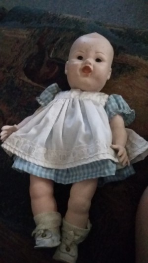 Identifying a Porcelain Doll - doll with painted on face and hair