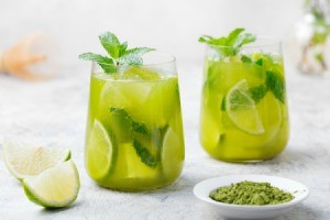 Fresh Mint Punch in glasses with lime slice
