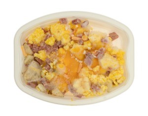 Prepared meal frozen in a plastic container