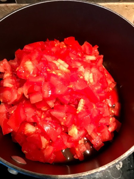 thickening tomatoes in pan
