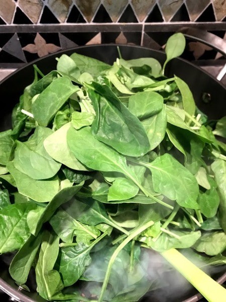 Spinach added to pan
