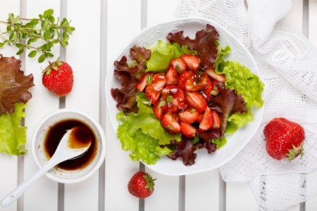 Strawberry salad with a balsamic dressing.