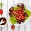 Strawberry salad with a balsamic dressing.