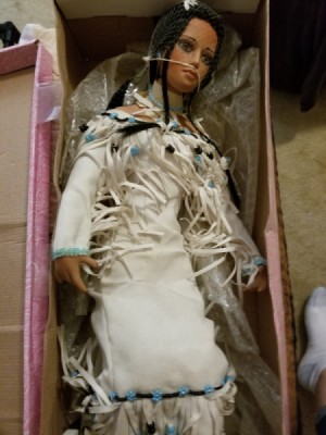 Value of a Porcelain Doll - native American doll