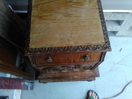 Value of an Ornately Carved End or Bedside Table
