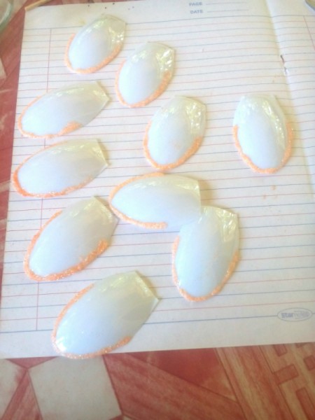 Recycled Candle Night Lamp - cut off the bowls of the spoons