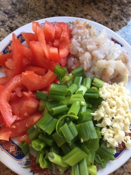 cut veggies and shrimp on plate