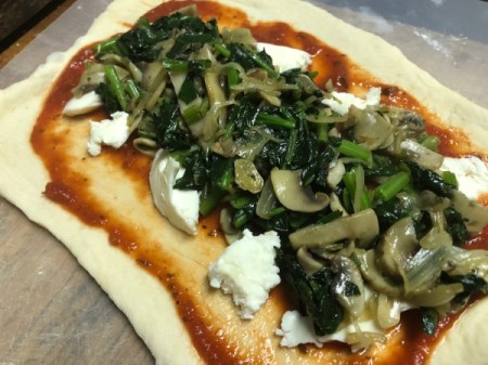 adding vegetables on cheese