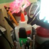 Newspaper Pen Organizer - pens, pencils, glue, and marker in organizer