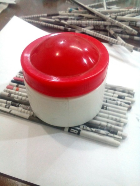Newspaper Pen Organizer - set a round object on top