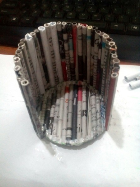 Newspaper Pen Organizer - take glued rolls and shape to fit as you stick down to the base