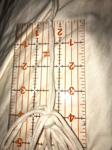 DIY Macrame Plant Hangers - tie knot the height of pot on each set of cords