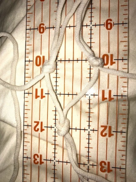 DIY Macrame Plant Hangers - take one cord and tie a knot with one from neighboring strands