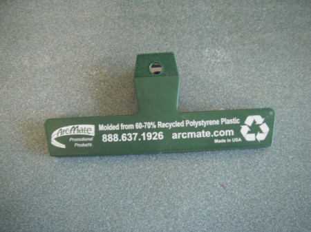 A chip clip, ready to be used to wedge a freezer door open.