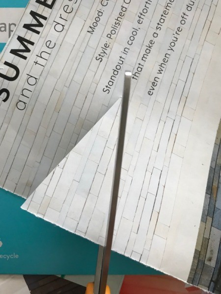 Up-cycled Clipboard - cut triangles from scrap paper