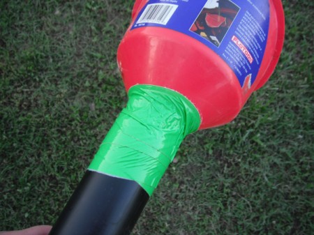Planting Seed in the Garden - funnel taped to pipe