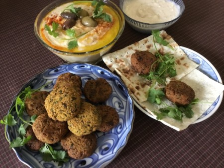 Herb Falafel on plate with dipping sauce