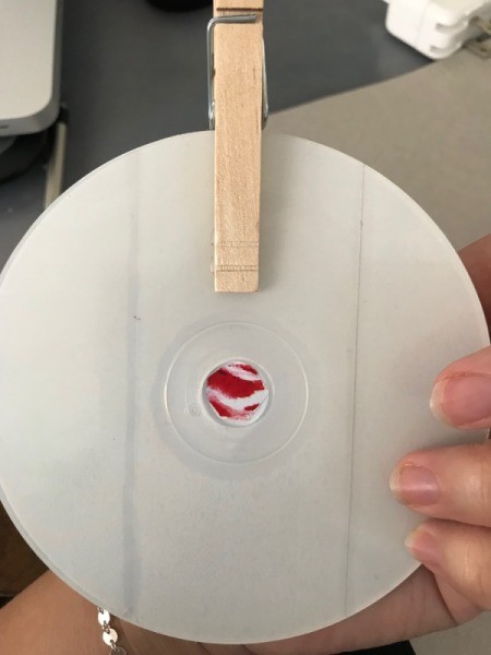 Wall Memo Clothespin Board - view of pin stuck to back of CD