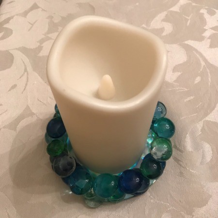 Recycled CD Candle Holder - looking down at LED candle in base