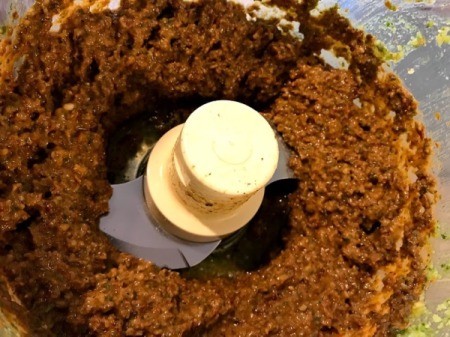 Sun-Dried Tomatoes, cheese, garlic and basil in food processor Pesto