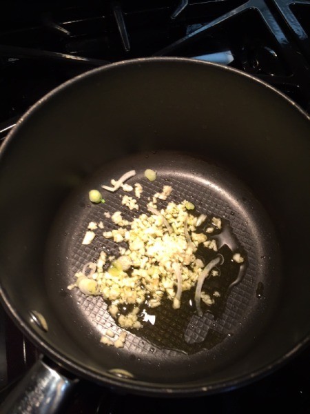 garlic and onions browning in pan