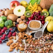 Collection of high fiber foods like vegetables, fruit, and nuts.